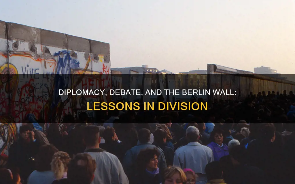 how does the berlin wall relate to debate and diplomacy