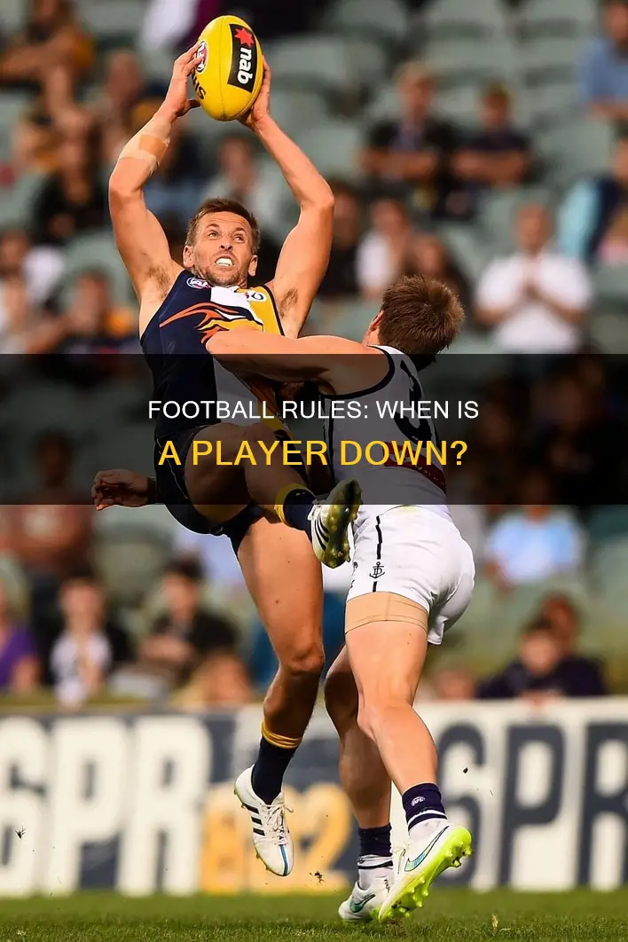 what constitutes a player being down in football